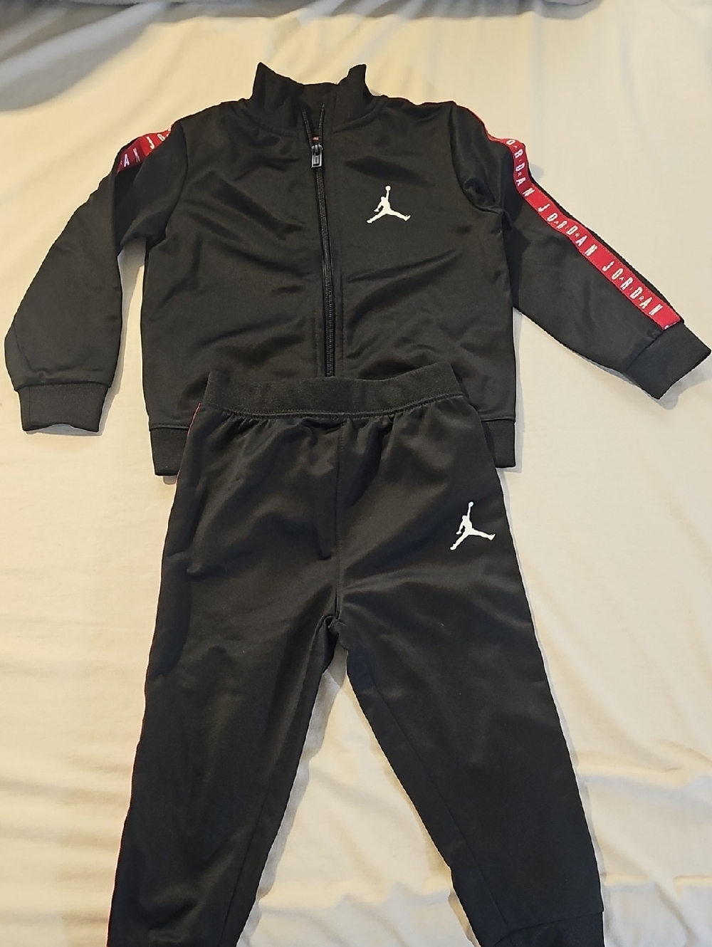 Jordan Black Kids Jogger Set with Red Sleeve Tape